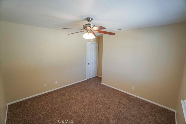 11540 Mohawk Rd, Apple Valley, CA 92308 - carpeted empty room with a ceiling fan and baseboards