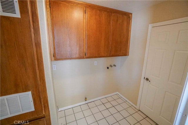 11540 Mohawk Rd, Apple Valley, CA 92308 - clothes washing area featuring cabinet space, hookup for a washing machine, and baseboards
