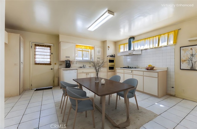 dining room featuring light tile patterned floors