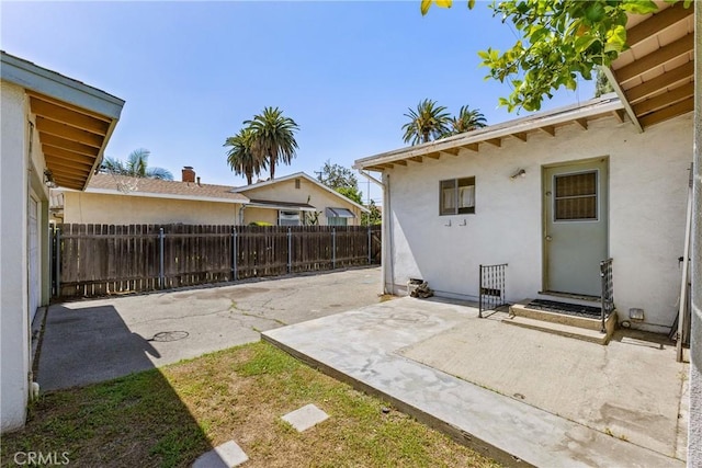 view of yard with a patio area and fence