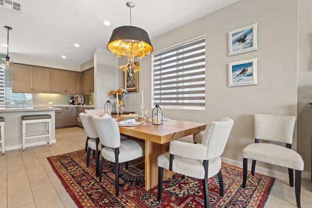 6132 Colt Pl Unit 101, Carlsbad, CA 92009 - dining room featuring recessed lighting and a chandelier