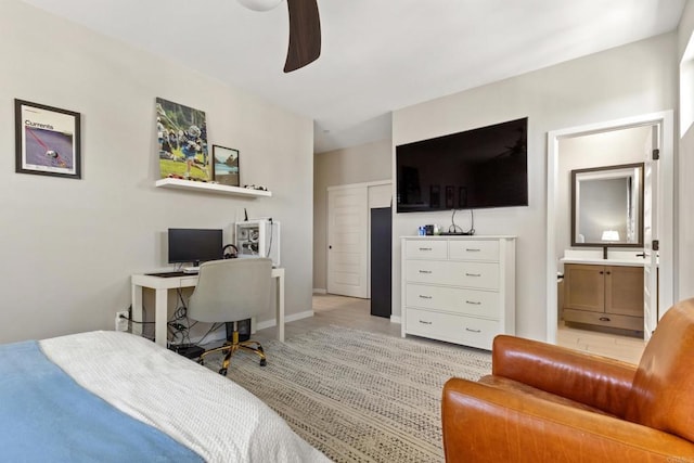6132 Colt Pl Unit 101, Carlsbad, CA 92009 - bedroom featuring light tile patterned floors, ceiling fan, ensuite bath, and an office area