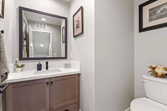 6132 Colt Pl Unit 101, Carlsbad, CA 92009 - bathroom with vanity and toilet