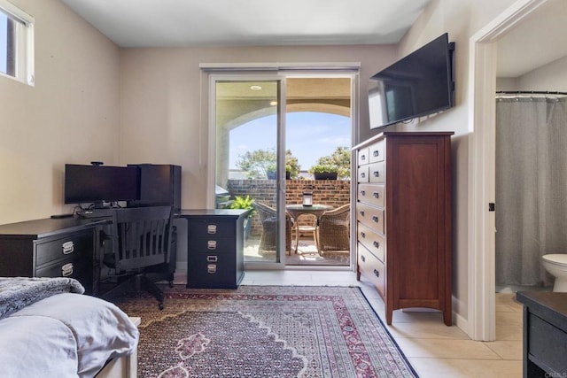 6132 Colt Pl Unit 101, Carlsbad, CA 92009 - bedroom with access to outside, light tile patterned floors, and an office area