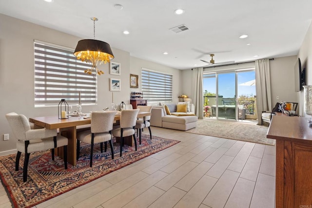 6132 Colt Pl Unit 101, Carlsbad, CA 92009 - dining space featuring a chandelier, light wood-style floors, recessed lighting, and a ceiling fan