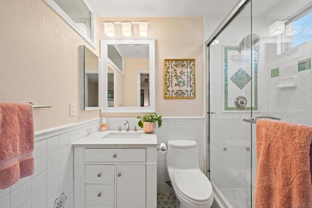 1850 Willowhaven Rd, Encinitas, CA 92024 - full bath with vanity, wainscoting, tile walls, and a stall shower