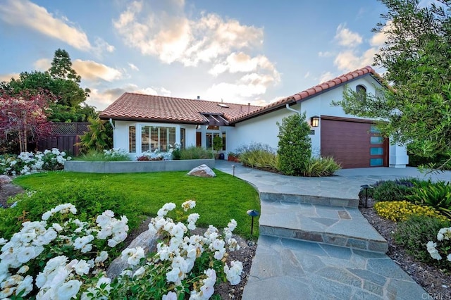 1850 Willowhaven Rd, Encinitas, CA 92024 - mediterranean / spanish-style home featuring a tile roof, an attached garage, stucco siding, and driveway