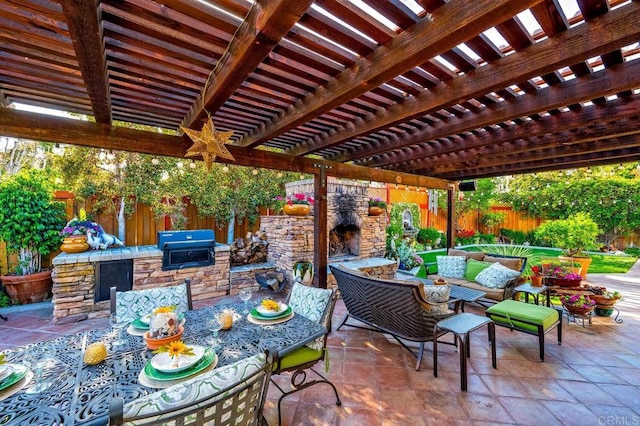 1850 Willowhaven Rd, Encinitas, CA 92024 - fenced backyard with an outdoor kitchen, a patio, an outdoor living space with a fireplace, and outdoor dining space