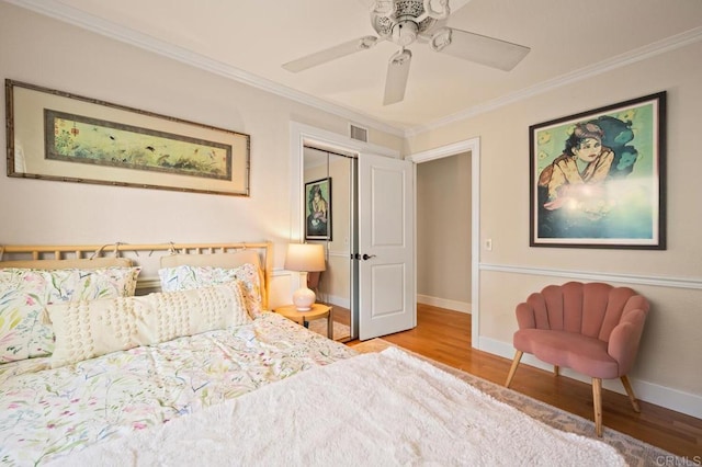 1850 Willowhaven Rd, Encinitas, CA 92024 - bedroom with wood finished floors, ornamental molding, a closet, and ceiling fan