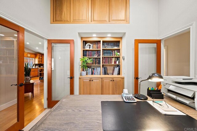 1850 Willowhaven Rd, Encinitas, CA 92024 - office area with light wood-style floors, built in shelves, recessed lighting, and french doors