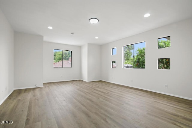 5131 Greenbush Ave, Sherman Oaks, CA 91423 - spare room with wood finished floors and recessed lighting