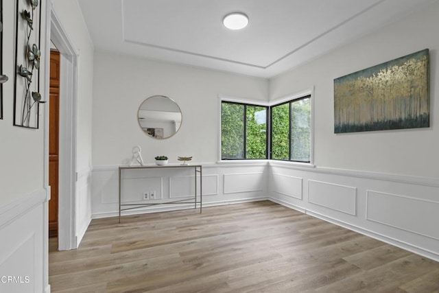 5131 Greenbush Ave, Sherman Oaks, CA 91423 - spare room with a decorative wall, wood finished floors, and a wainscoted wall