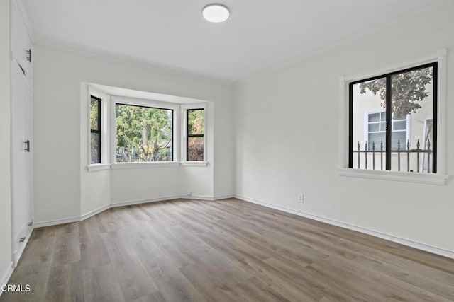 5131 Greenbush Ave, Sherman Oaks, CA 91423 - unfurnished room with wood finished floors and ornamental molding