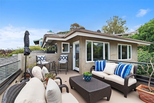 1981 San Remo, Laguna Beach, CA 92651 - back of house featuring outdoor lounge area, stucco siding, and a patio