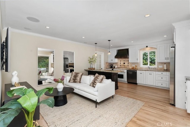 1981 San Remo, Laguna Beach, CA 92651 - living room with light wood-style floors, crown molding, and recessed lighting