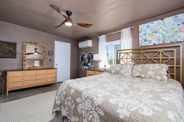 61961 Aster Pl, Joshua Tree, CA 92252 - bedroom with an AC wall unit and a ceiling fan