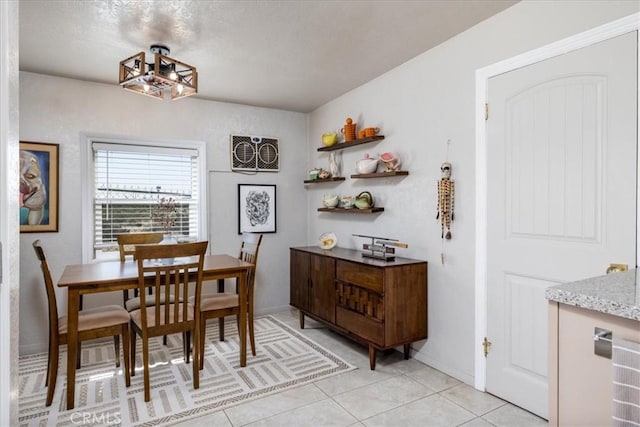 61961 Aster Pl, Joshua Tree, CA 92252 - dining area with baseboards and light tile patterned floors