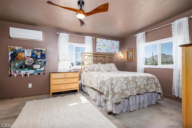 61961 Aster Pl, Joshua Tree, CA 92252 - bedroom with a wall mounted air conditioner and a ceiling fan