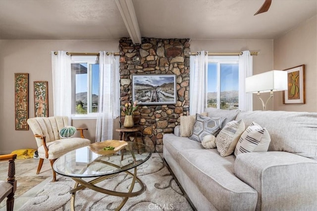 61961 Aster Pl, Joshua Tree, CA 92252 - living area with beamed ceiling and a ceiling fan