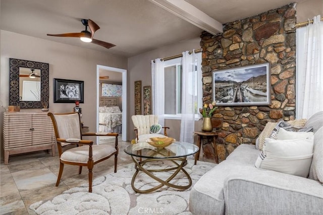 61961 Aster Pl, Joshua Tree, CA 92252 - living room featuring beam ceiling and a ceiling fan