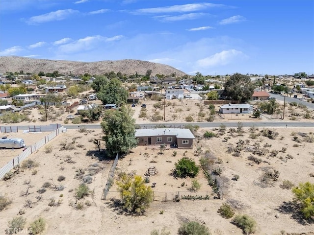 61961 Aster Pl, Joshua Tree, CA 92252 - view of mountain backdrop featuring a desert landscape and nearby suburban area