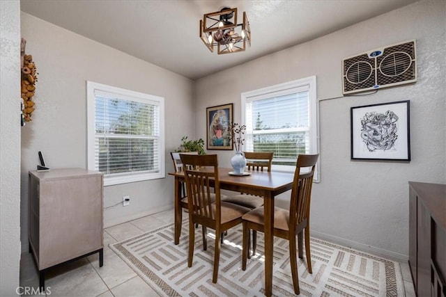 61961 Aster Pl, Joshua Tree, CA 92252 - dining space featuring a chandelier and light tile patterned floors