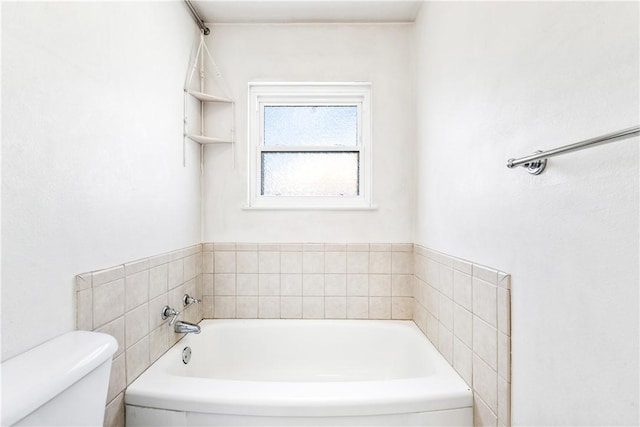 17331 Newland St, Huntington Beach, CA 92647 - bathroom featuring toilet and a garden tub