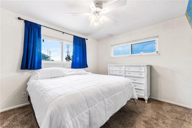 17331 Newland St, Huntington Beach, CA 92647 - bedroom featuring carpet floors, baseboards, multiple windows, and a ceiling fan