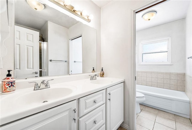 17331 Newland St, Huntington Beach, CA 92647 - bathroom with tile patterned floors, toilet, double vanity, a bath, and a shower