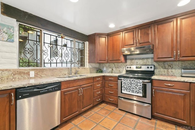 6036 Rainbow Heights Rd, Fallbrook, CA 92028 - kitchen with appliances with stainless steel finishes, under cabinet range hood, a sink, tasteful backsplash, and light stone counters
