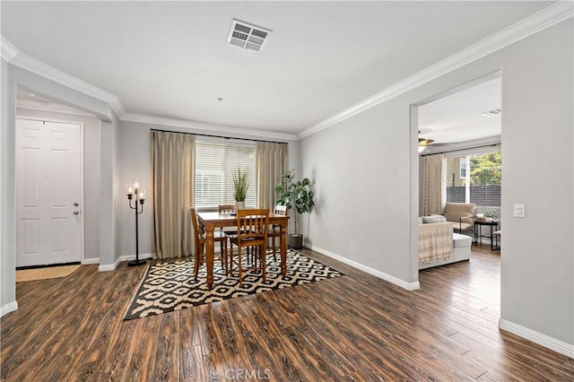 27423 Larabee Ct Unit 3, Murrieta, CA 92562 - dining area with baseboards, ornamental molding, and dark wood-type flooring