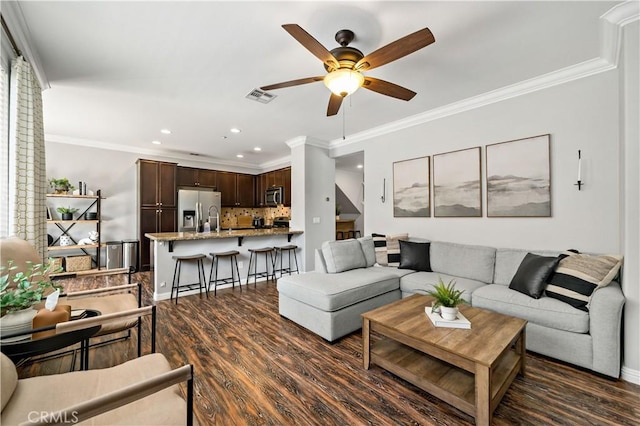 27423 Larabee Ct Unit 3, Murrieta, CA 92562 - living area with a ceiling fan, recessed lighting, dark wood finished floors, and ornamental molding