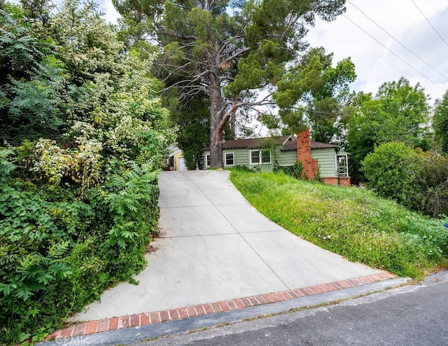 22460 Venido Rd, Woodland Hills, CA 91364 - single story home with a chimney