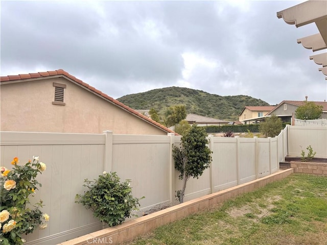 18016 Ribwort Rd, San Bernardino, CA 92407 - fenced backyard featuring a mountain view