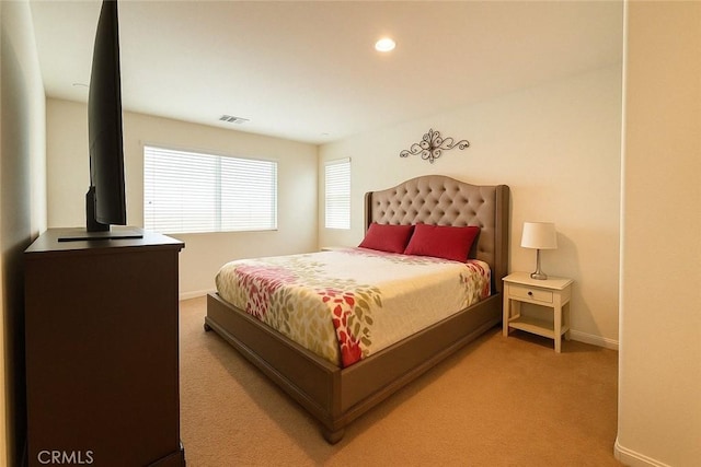 18016 Ribwort Rd, San Bernardino, CA 92407 - bedroom with baseboards, light carpet, and recessed lighting