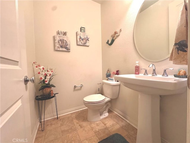 18016 Ribwort Rd, San Bernardino, CA 92407 - bathroom with toilet and baseboards