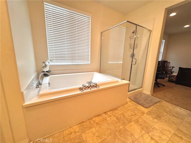 18016 Ribwort Rd, San Bernardino, CA 92407 - bathroom featuring a garden tub, a shower stall, and recessed lighting