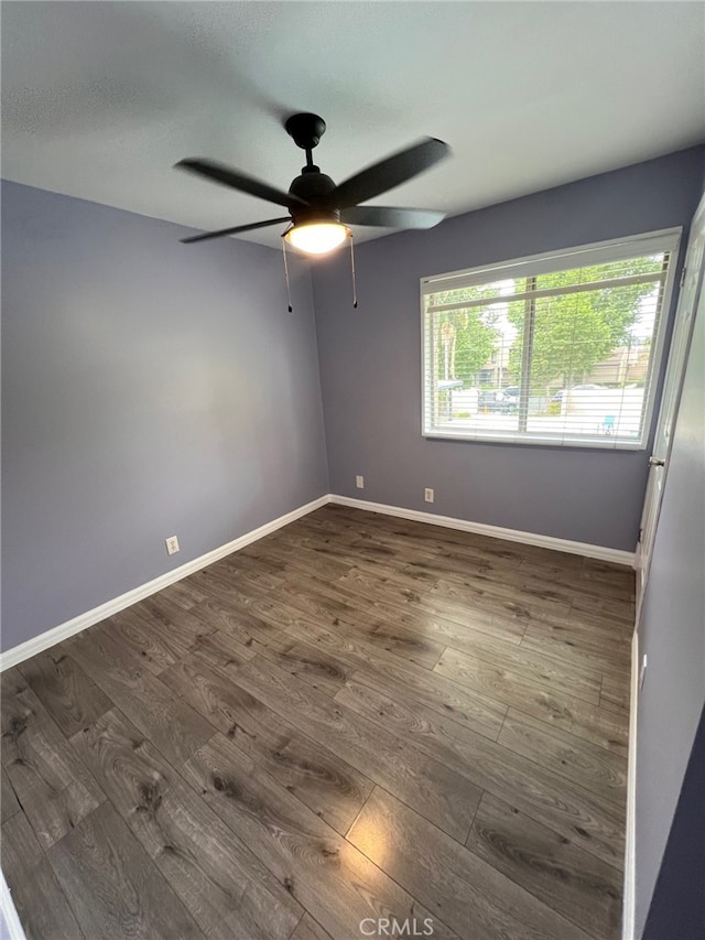 1007 Harrington Way, West Covina, CA 91792 - unfurnished room with ceiling fan, dark wood-style flooring, and baseboards