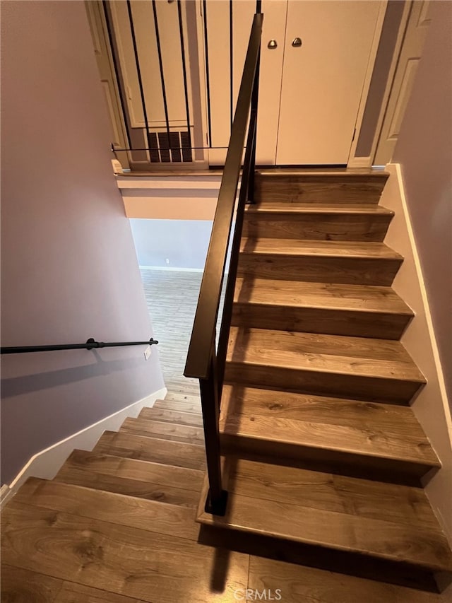 1007 Harrington Way, West Covina, CA 91792 - stairway with wood finished floors and baseboards