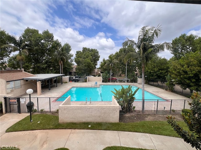 1007 Harrington Way, West Covina, CA 91792 - community pool featuring fence, a patio area, and view of scattered trees