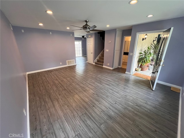 1007 Harrington Way, West Covina, CA 91792 - unfurnished room with stairway, recessed lighting, baseboards, dark wood-type flooring, and ceiling fan