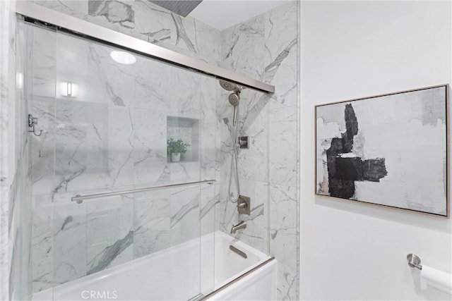 bathroom with enclosed tub / shower combo