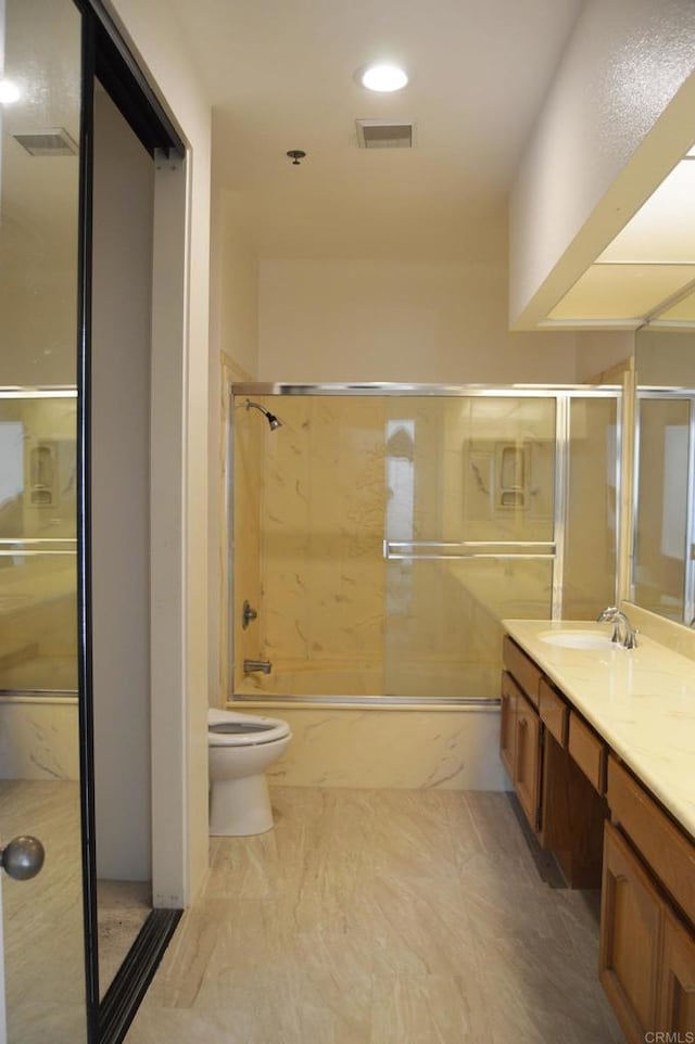 5845 Friars Rd Unit 1316, San Diego, CA 92110 - bathroom featuring vanity, shower / bath combination with glass door, toilet, recessed lighting, and marble finish flooring