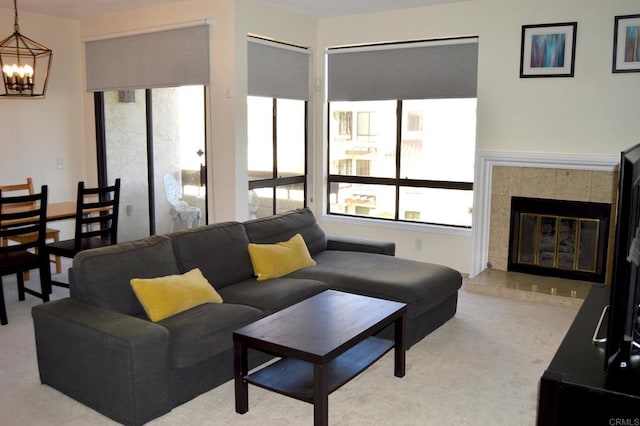 5845 Friars Rd Unit 1316, San Diego, CA 92110 - living area featuring a chandelier, a tile fireplace, and carpet