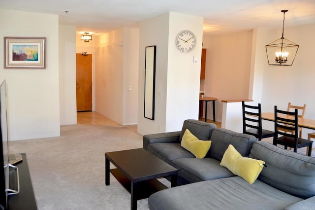 5845 Friars Rd Unit 1316, San Diego, CA 92110 - living room featuring a chandelier and light colored carpet