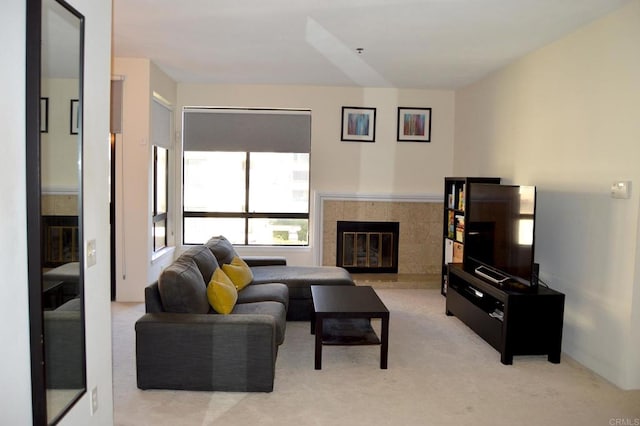 5845 Friars Rd Unit 1316, San Diego, CA 92110 - living room featuring a fireplace and light colored carpet