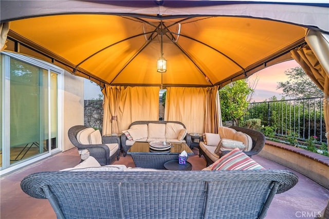 22541 Wakefield, Mission Viejo, CA 92692 - patio terrace at dusk featuring a gazebo, an outdoor hangout area, and fence