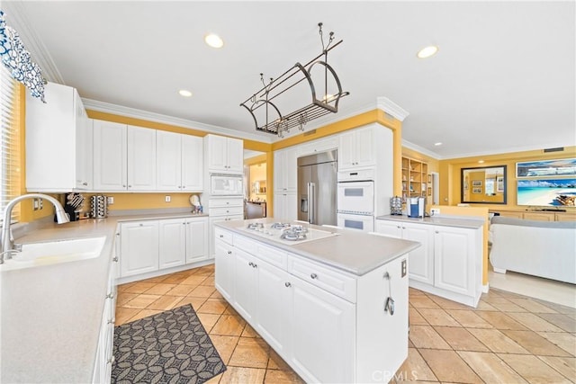 22541 Wakefield, Mission Viejo, CA 92692 - kitchen featuring white appliances, a sink, a kitchen island, light countertops, and recessed lighting