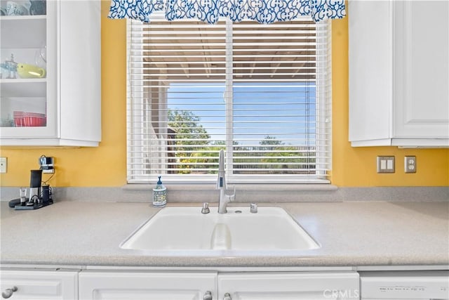 22541 Wakefield, Mission Viejo, CA 92692 - kitchen with a sink, white cabinetry, light countertops, and glass insert cabinets