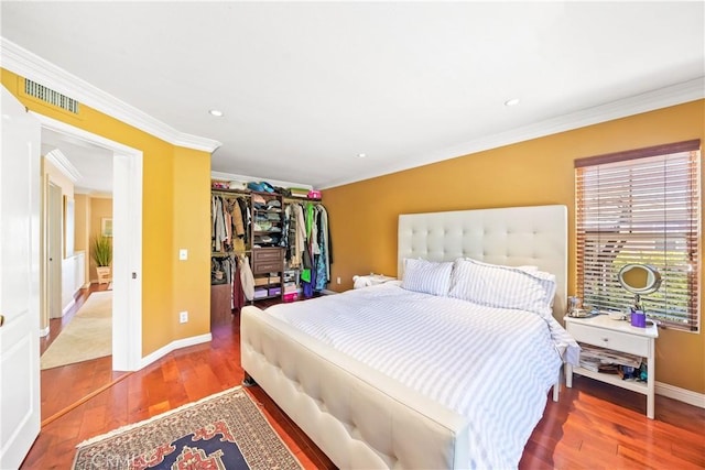 22541 Wakefield, Mission Viejo, CA 92692 - bedroom with wood finished floors, ornamental molding, baseboards, a closet, and recessed lighting